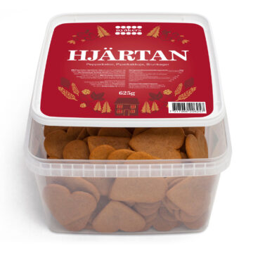 Viereckige Kunststoffdosse, durchsichtig, mit rotem Deckel. Auf dem Deckel ist die Produktbeschreibung und eine Verzeirung im Retro-Stil. Durch alle vier Seiten und durch den Boden sind die Pfefferkuchenherzen zu sehen.